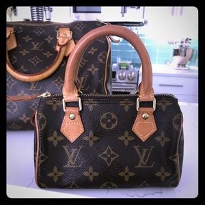Authentic LOUIS VUITTON Mini Speedy